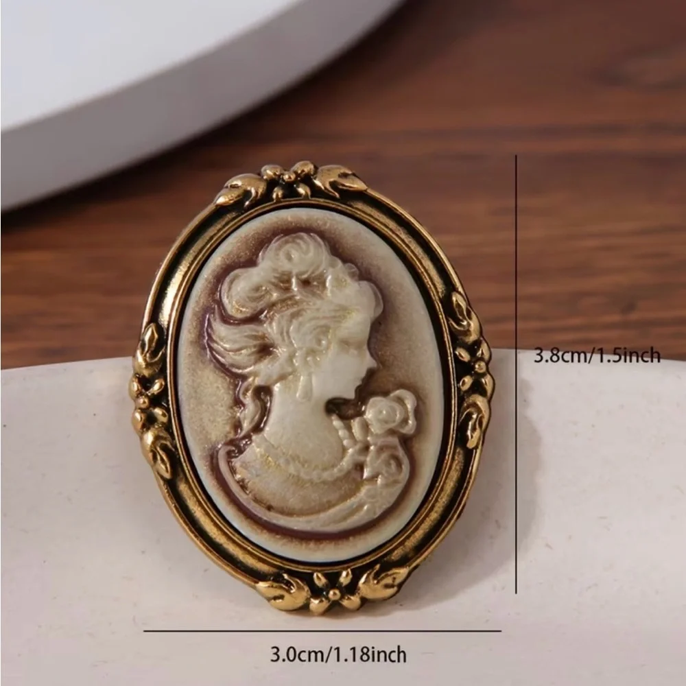 New vintage-style looking cameo brooch resin portrait gold-toned metal frame